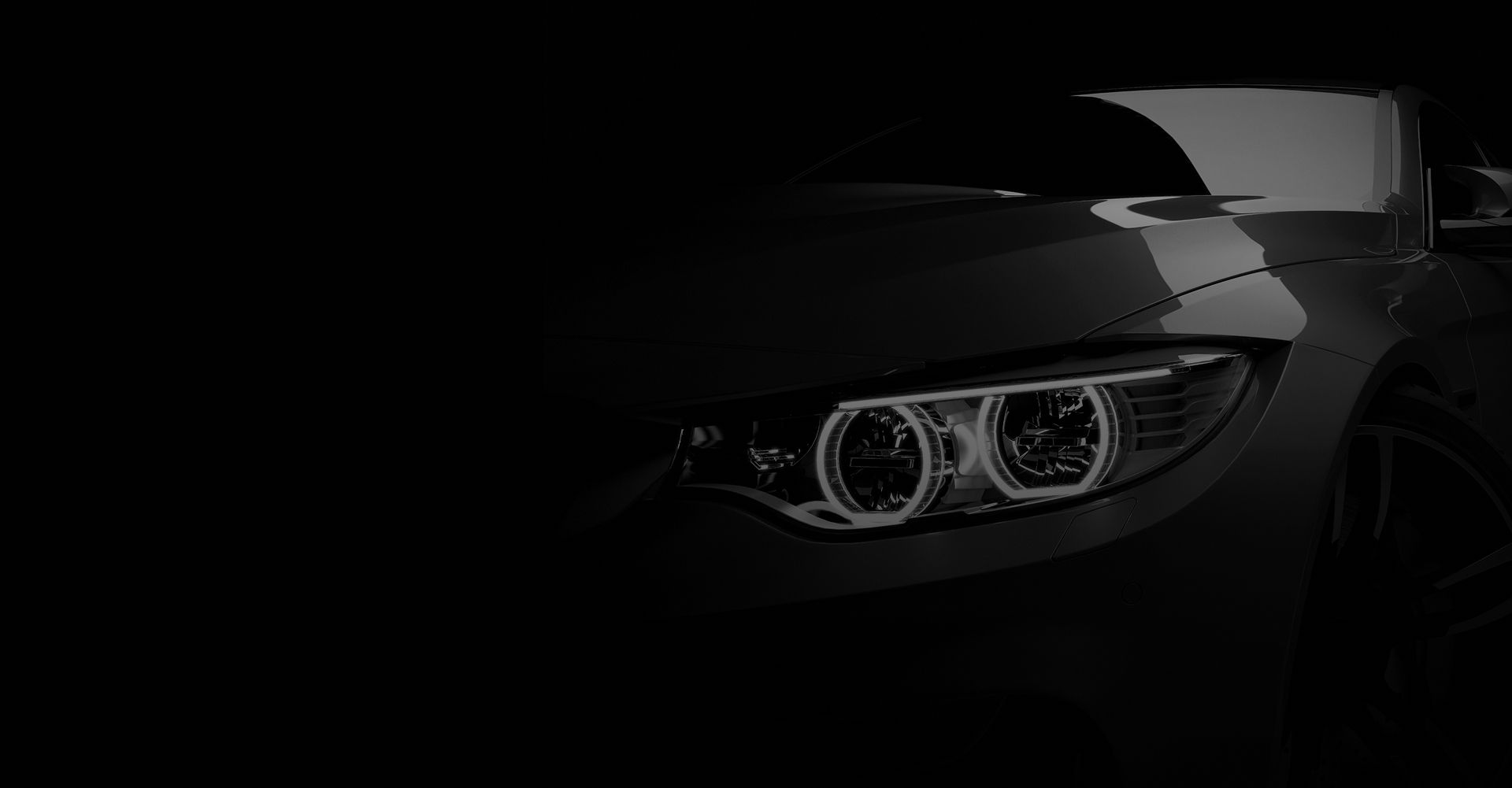 Weißer BMW auf schwarzem Hintergrund